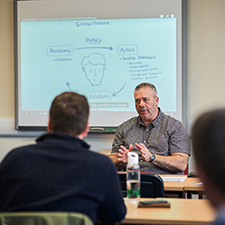lecturer and students in classroom